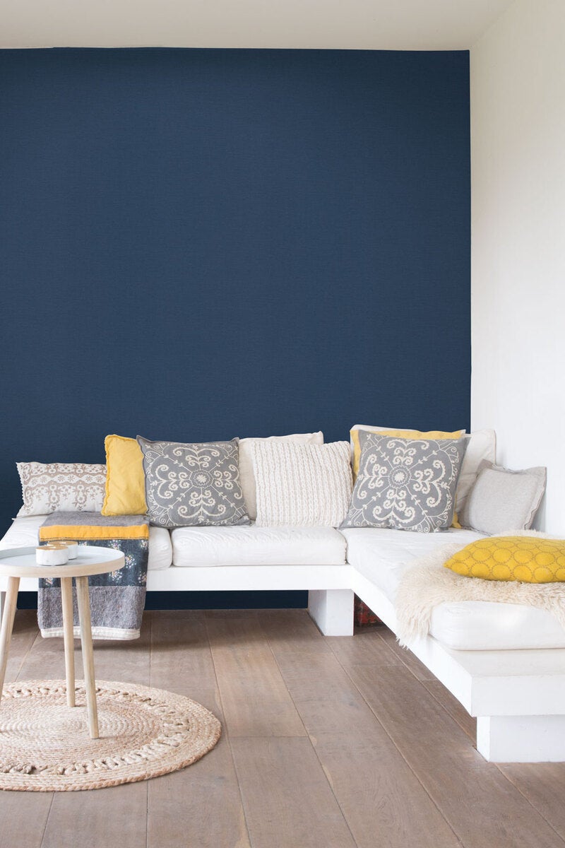 Collage, mörkblå tapet