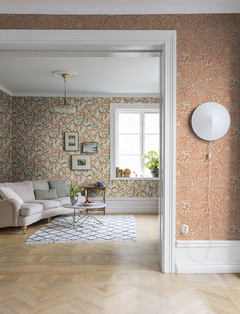 Bodri blommor och blad i grönt och orange