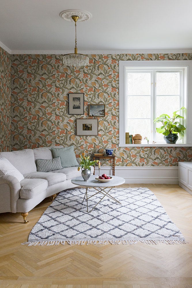 Bodri blommor och blad i grönt och orange